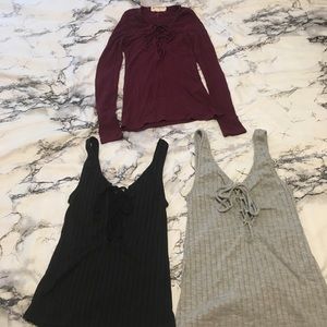 Bundle of lace up shirts